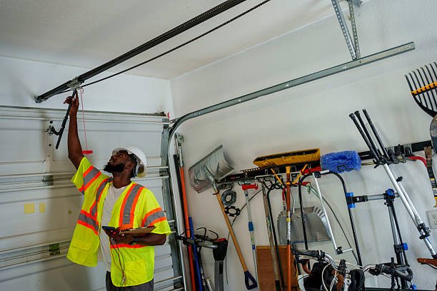 Professional Garage Door Panel Replacement technician working in Pinewood, FL